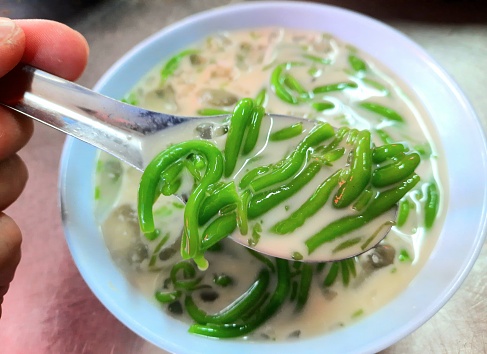 Eating Cold Cendol in coconut milk - Bangkok street food.