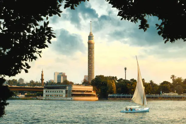 Photo of Egypt, Cairo - View of Nile River and Cairo Tower with Buildings, Zamalek, Sunset View.