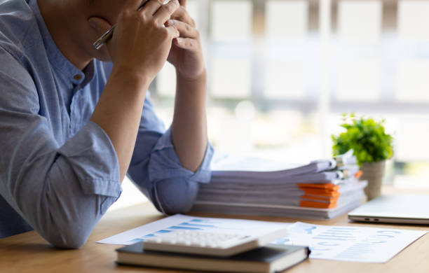 istock Businessman depressed and stressed in the office. 1522477146