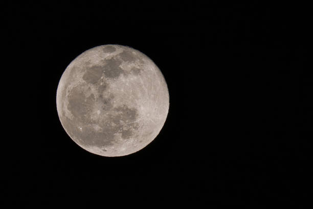 istock Full Moon in the night dark sky 1522483446
