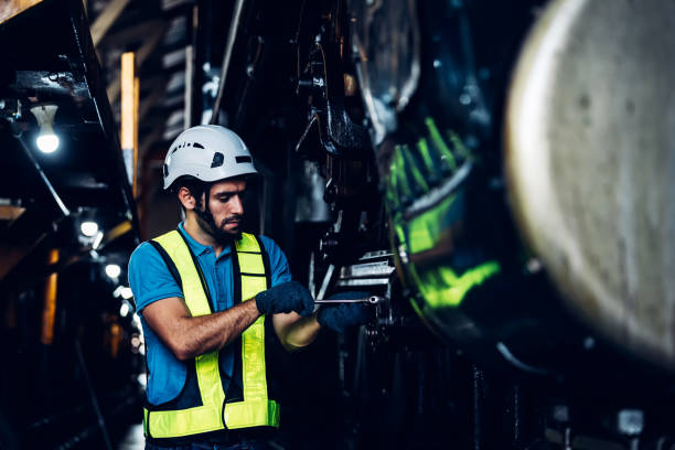 istock Workers Factory or Engineering work at factory site check up machine or products in site. Foreman or Technician checking Material or Machine on Plant. Heavy industry factory concept. 1522499923
