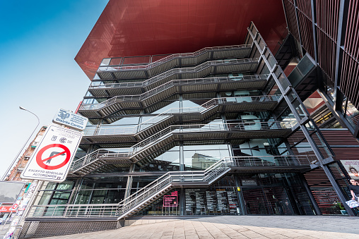 Madrid, Spain - June 27, 2023: Madrid, Spain - June 27, 2023: Hot and quiet morning in the surroundings of the Museo Nacional Centro de Arte Reina Sofía, in Madrid. The museum is mainly dedicated to Spanish art. Highlights of the museum include excellent collections of Spain's two greatest 20th-century masters, Pablo Picasso and Salvador Dalí.