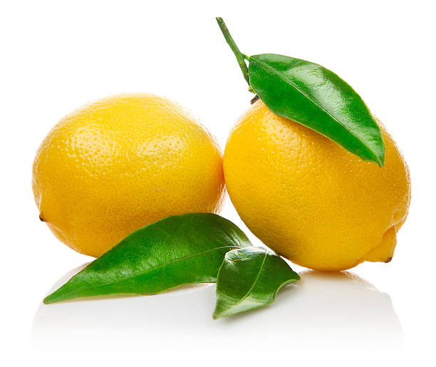 istock fresh lemons with green leaves 152254142