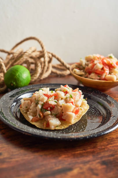istock Delicious ceviche of fish with vegetables and tostadas 1522552583