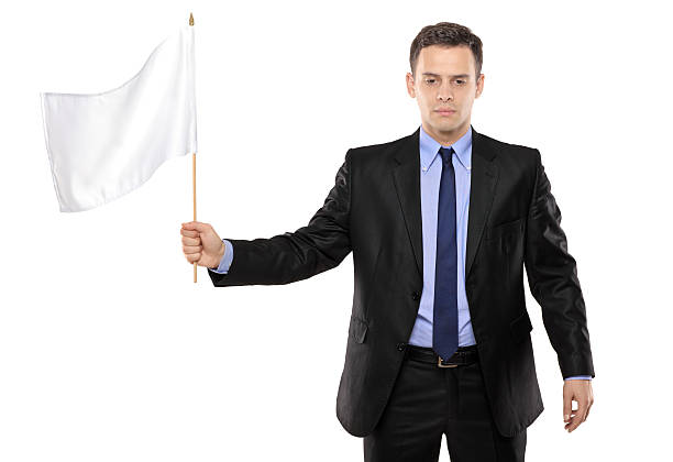 istock Sad man holding a white flag gesturing defeat 152256652