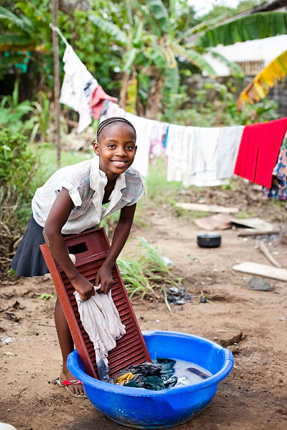 istock african girl washing clothes 152258767