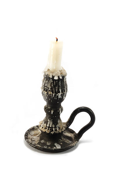 istock Old black candlestick with candle on white backround, isolated 152259953