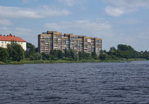 istock View of buildings by river against sky 1522616400