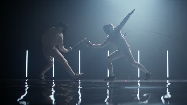 Two professional male fencers clashing in combat on an epic lit-up blue stage. Lunging forward
