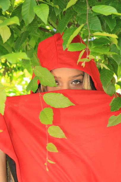 red melting dress in forest