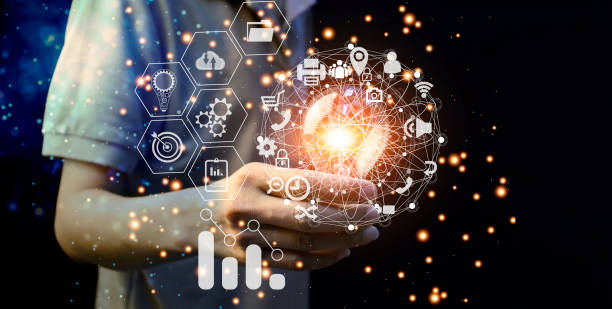 istock Man holding light bulb, new idea with AI technology, innovation and creativity. Get creative with glowing light bulbs. 1522756292