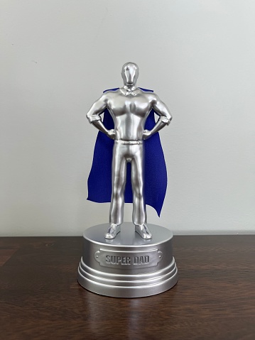 The close up, isolated image of a trophy for a super dad on father's day.