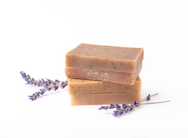 istock Natural soap with lavender extract. Handmade soap with lavender flowers isolated on white background. spa and relaxation concept.Aromatherapy.Flat lay.Place for text.Place for copy. 1522851853