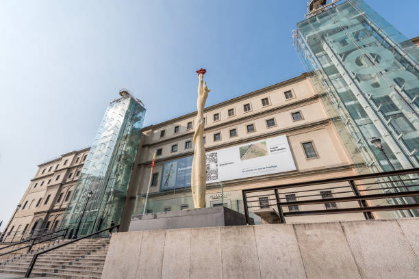 Museo Nacional Centro de Arte Reina Sofía Madrid, Spain - June 27, 2023: Madrid, Spain - June 27, 2023: Hot and quiet morning in the surroundings of the Museo Nacional Centro de Arte Reina Sofía, in Madrid. The museum is mainly dedicated to Spanish art. Highlights of the museum include excellent collections of Spain's two greatest 20th-century masters, Pablo Picasso and Salvador Dalí. contemporary madrid european culture travel destinations stock pictures, royalty-free photos & images