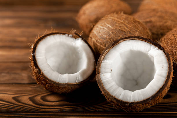 istock Coconuts on a wooden background. Close-up. 1522892953