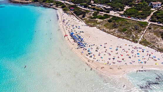 Aerial view of  popular white sand beach La Pelosa,  Sardegna island, Italy