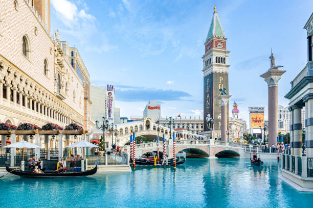 The Venetian Resort Hotel and Casino opened on May 3, 1999 with flutter of white doves, sounding trumpets, singing gondoliers and actress Sophia Loren. stock photo