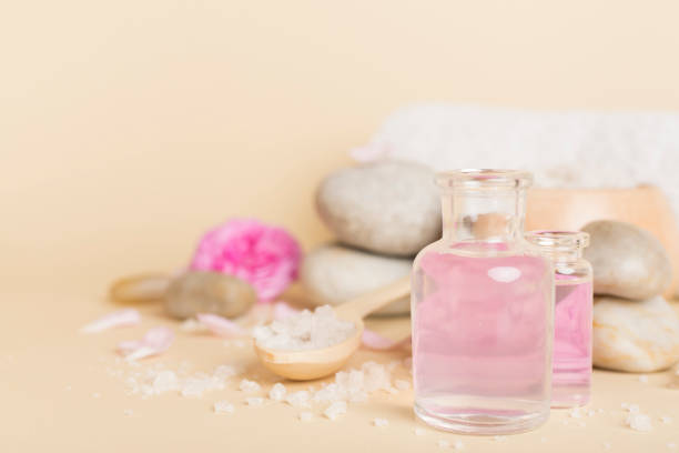 istock Spa composition with pink roses on wooden table 1522986065