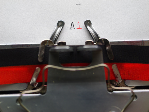 A closeup of the mechanical keys on an old typewriter