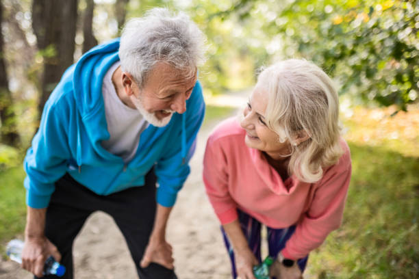 istock Seniors in park taking a break after jogging 1523004413