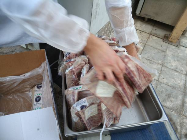 istock The lamb meat on trolley with man's hand 1523009152