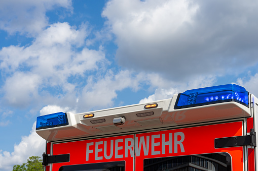 Close up of blue flash light of ambulance car, Berlin central