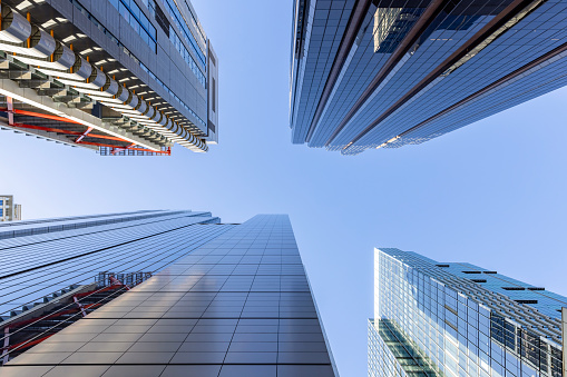 Low angle view of modern office buildings, skyscrapers, Sydney NSW, background with copy space, full frame horizontal composition
