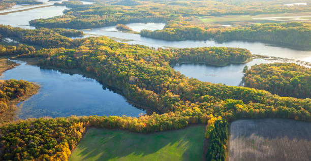 Aerial view of the Mississippi River and farm fields in northern Minnesota on a bright autumn morning stock photo