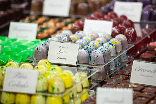 Close up view of stand of colorful candies. Unhealthy food concept.