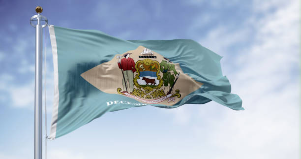Delaware state flag waving on a clear day