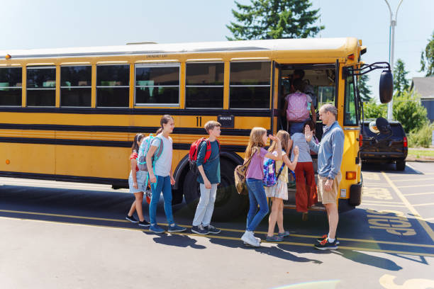 istock Teacher giving students high five after school 1523376942