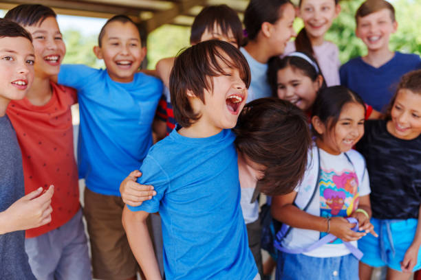 istock School friends laughing together 1523376960
