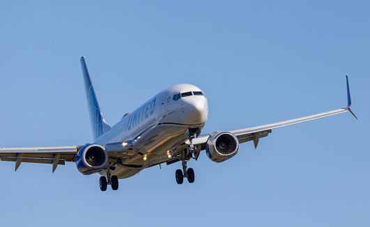 Portland, Oregon, USA - June 4, 2023: A United Airlines Boeing 737 landing at Portland International Airport.