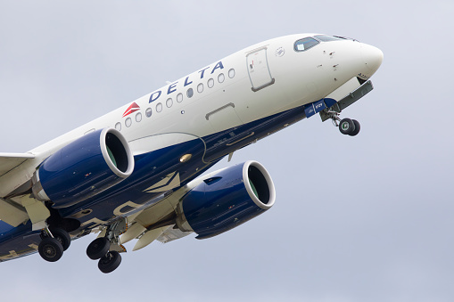 Portland, Oregon, USA - June12, 2022: A Delta Airlines Airbus A220-100 takes off from Portland International Airport.