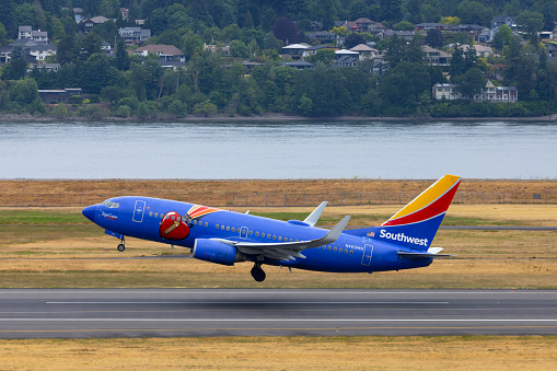 Portland, Oregon, USA - June 9, 2023: The Southwest Airlines Triple Crown livery 737 takes off from Portland International Airport.