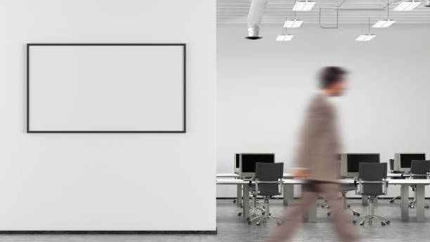 istock Blank horizontal poster mock up on the wall of modern office interior. 1523470124