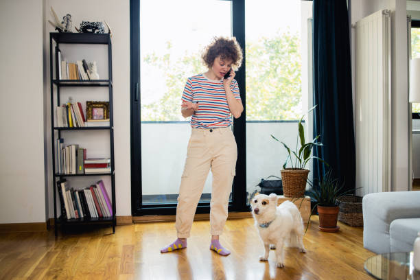 istock Woman uses a smartphone 1523628076