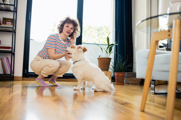 istock Woman is using the smartphone at home while relaxing 1523628085