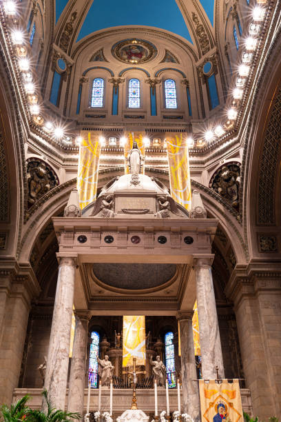 baldachin supported by doric columns above altar and sanctuary inside basilica of st mary built in beaux arts architectural style minneapolis minnesota