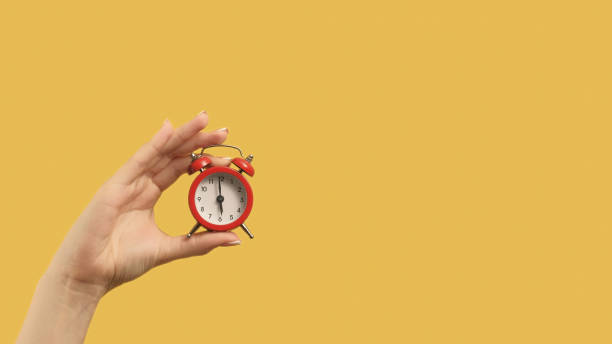 istock Time management progress achievement hand alarm 1523667194