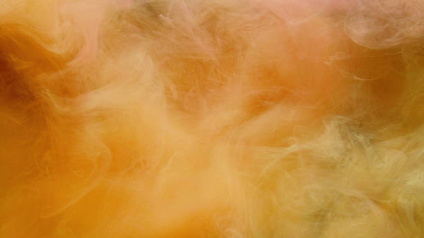 istock Color steam cloud abstract background yellow smoke 1523667734
