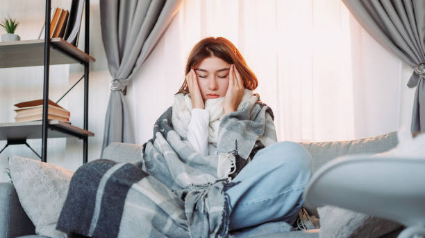 istock Headache symptom feeling flu unhealthy woman pain 1523668832