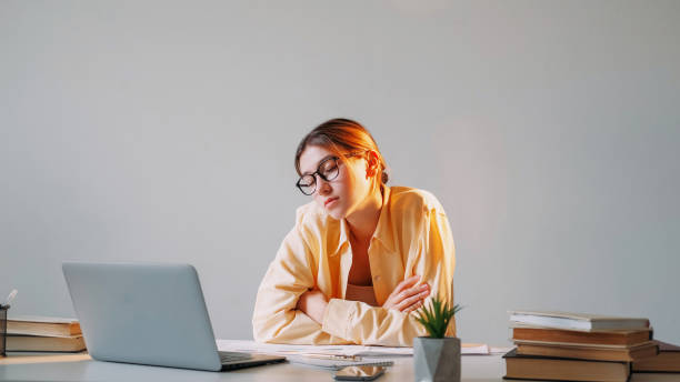 istock Work fatigue remote sleeping overworked woman 1523668845