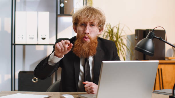 istock Business man working on office laptop pointing to camera looking with happy expression making choice 1523675214
