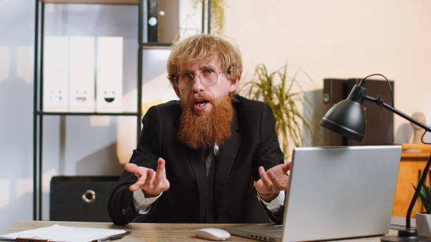 istock Confused businessman embarrassed about ambiguous question, having doubts, no answer idea, clueless 1523675217