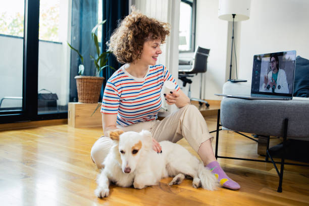 istock Young woman talking online with her doctor 1523861496