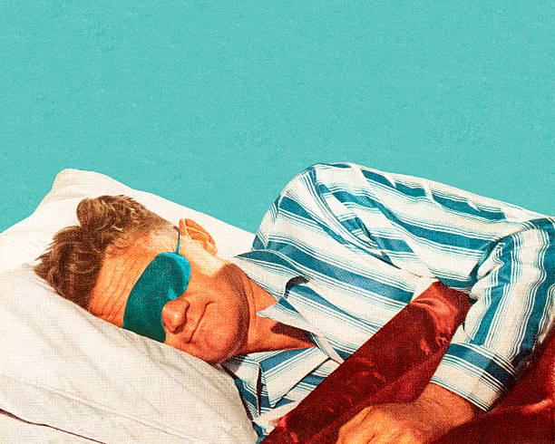 sleeping man wearing eye mask - şekerleme illüstrasyonlar stock illustrations