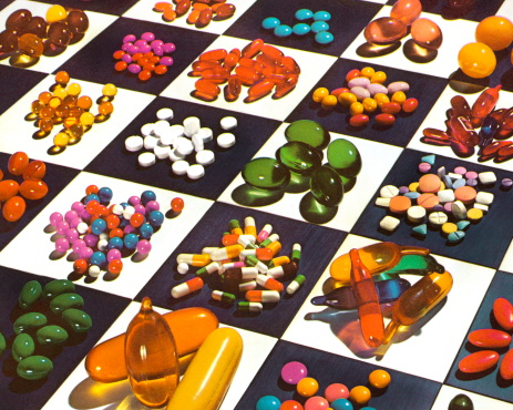Various Pills on Checkerboard