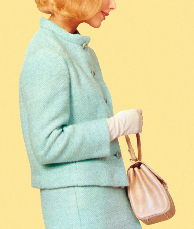 Woman in Blue Sui Holding Purse