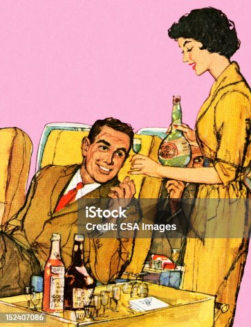 istock Stewardess Serving Drinks on Airplane 152407086